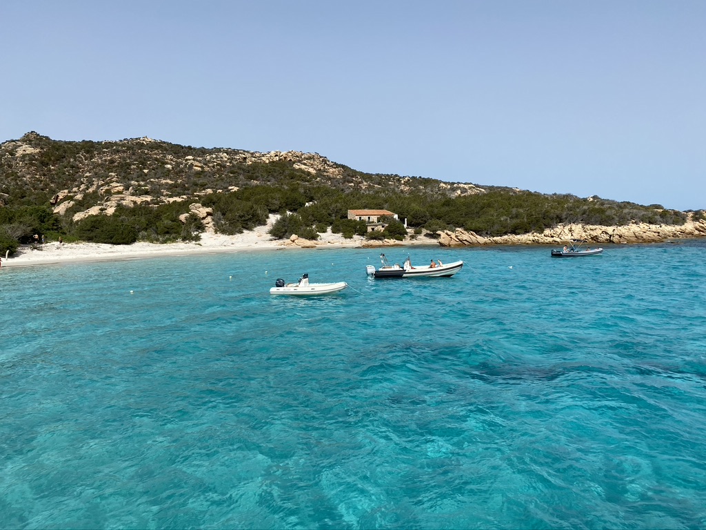 Turquoise waters and pristine white beaches of Sardinia.